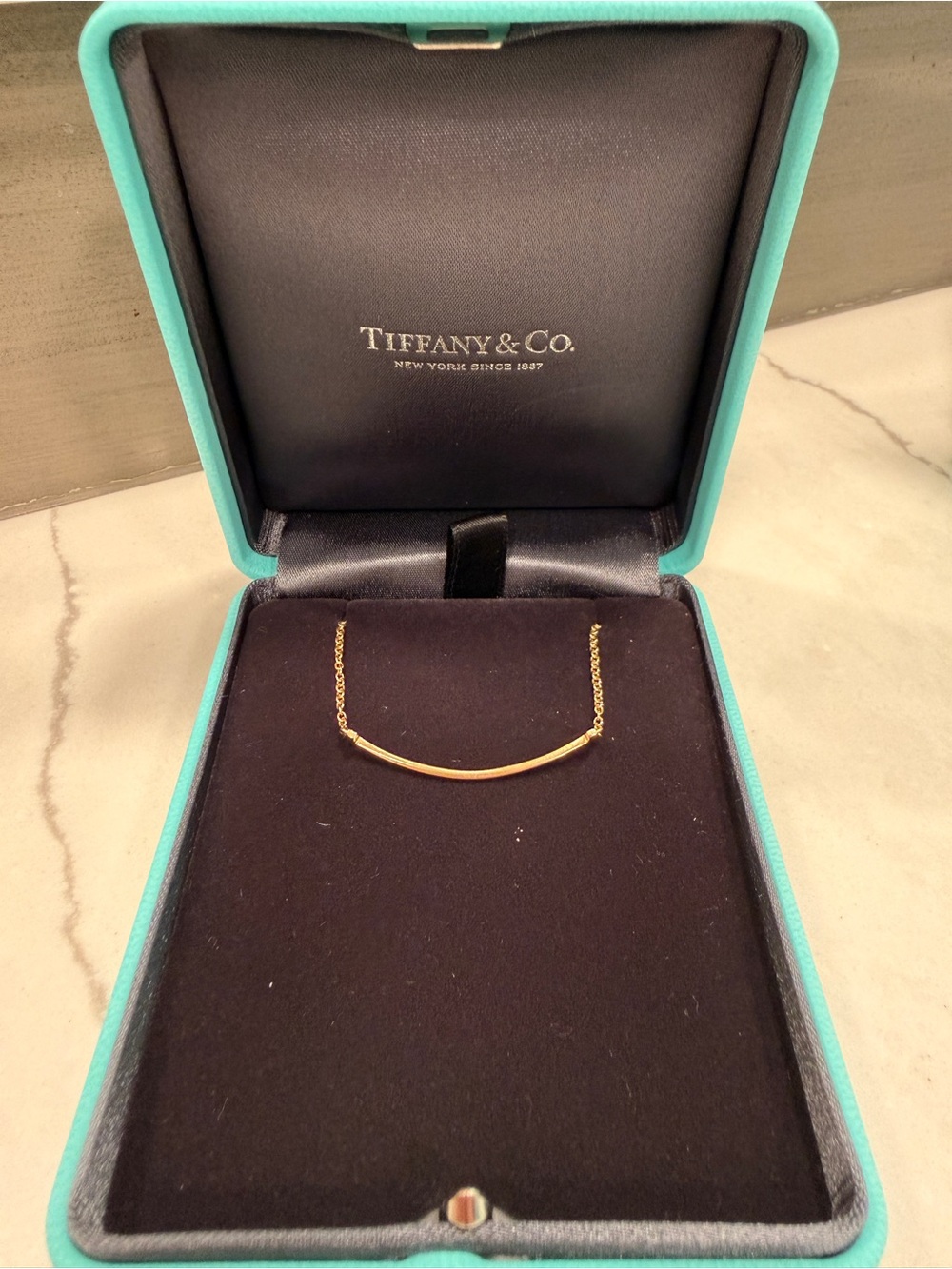 Tiffany & Co. 18k Yellow Gold "T Smile”
Chain Bracelet